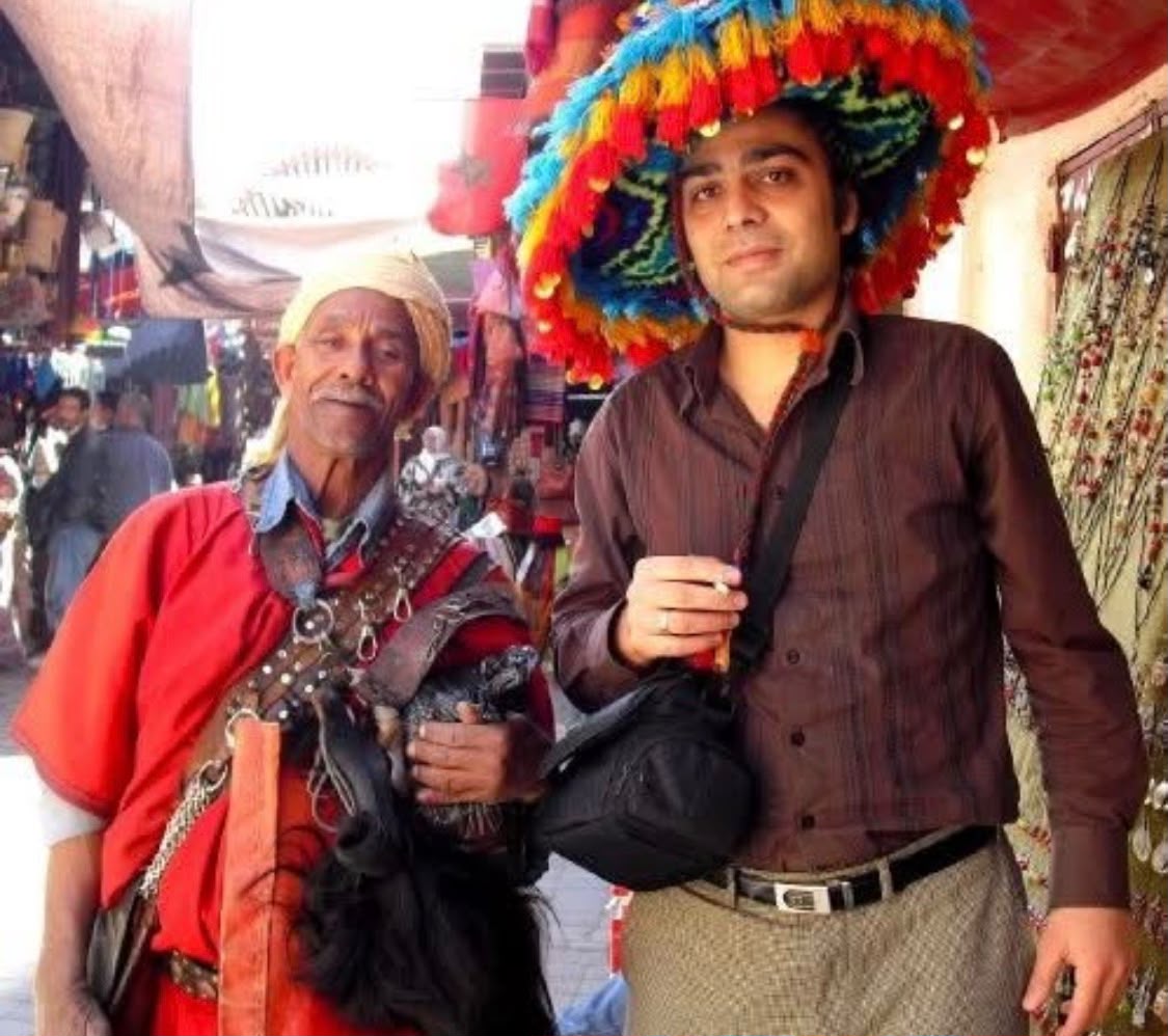 Murat with a local musician at a market