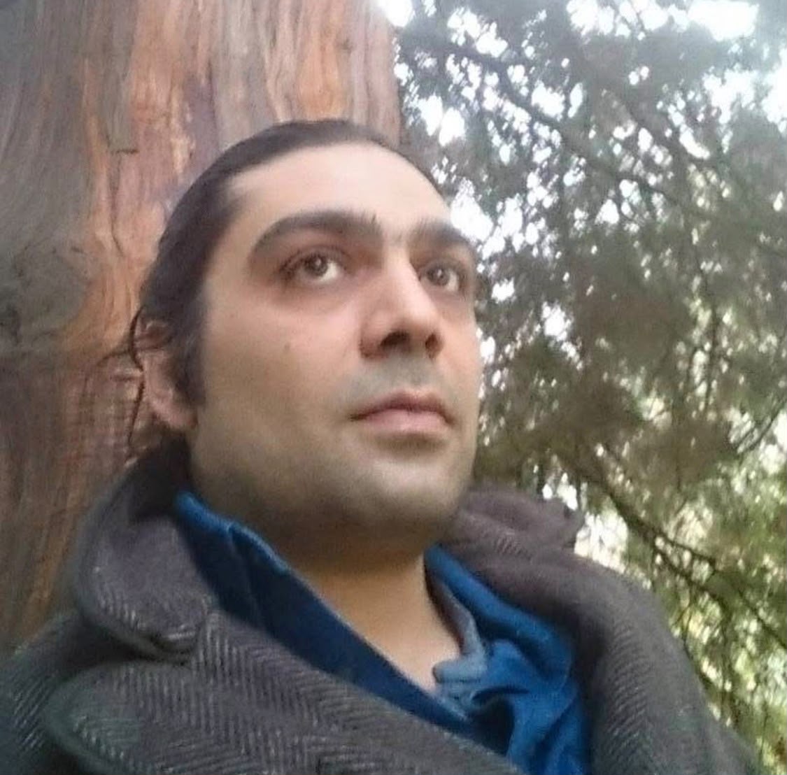 Murat beneath a tree